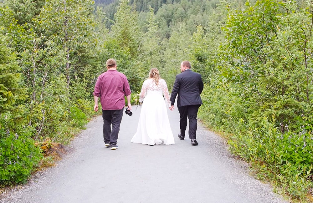 Adam Reynolds walking with couple in Juneau Alaska